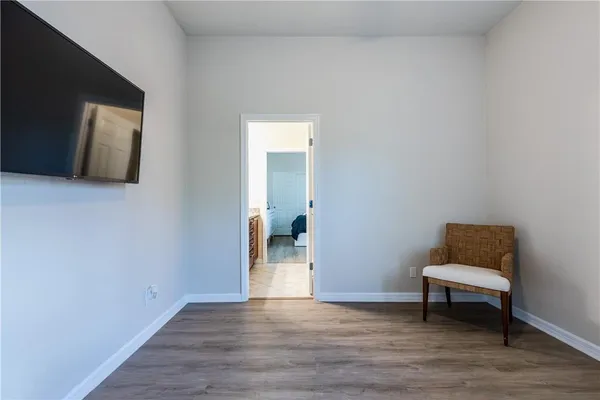 a view of livingroom with furniture and wooden floor