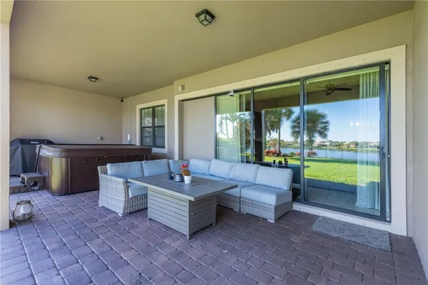 a view of outdoor space with green field and trees