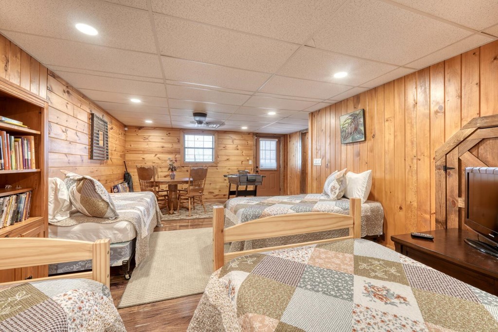 450 Mull Valley Road Morganton, GA 30560 - Photo 21 of 36 a living room with furniture a flat screen tv and a fireplace