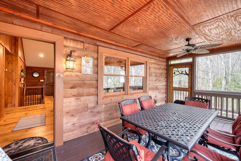 450 Mull Valley Road Morganton, GA 30560 - Photo 23 of 36 a outdoor space with a large window and couch
