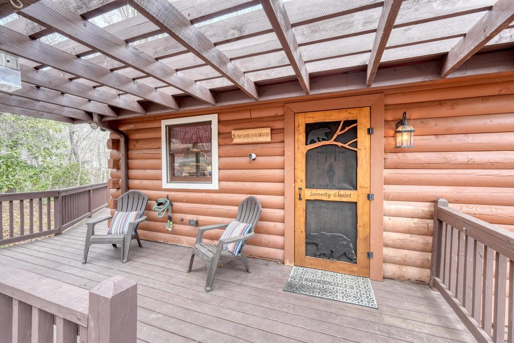 450 Mull Valley Road Morganton, GA 30560 - Photo 27 of 36 a porch with seating space and wooden floor