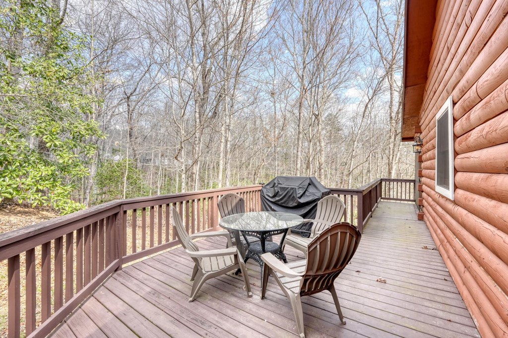 450 Mull Valley Road Morganton, GA 30560 - Photo 28 of 36 a view of balcony with wooden floor and outdoor seating