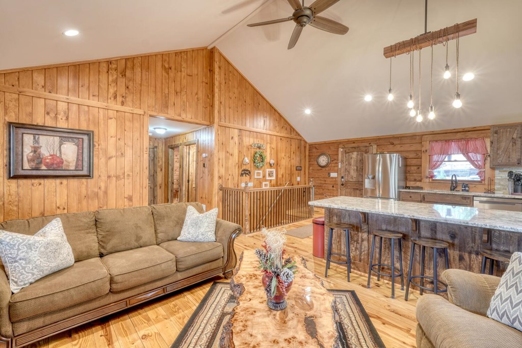 450 Mull Valley Road Morganton, GA 30560 - Photo 6 of 36 a living room with furniture and a large window