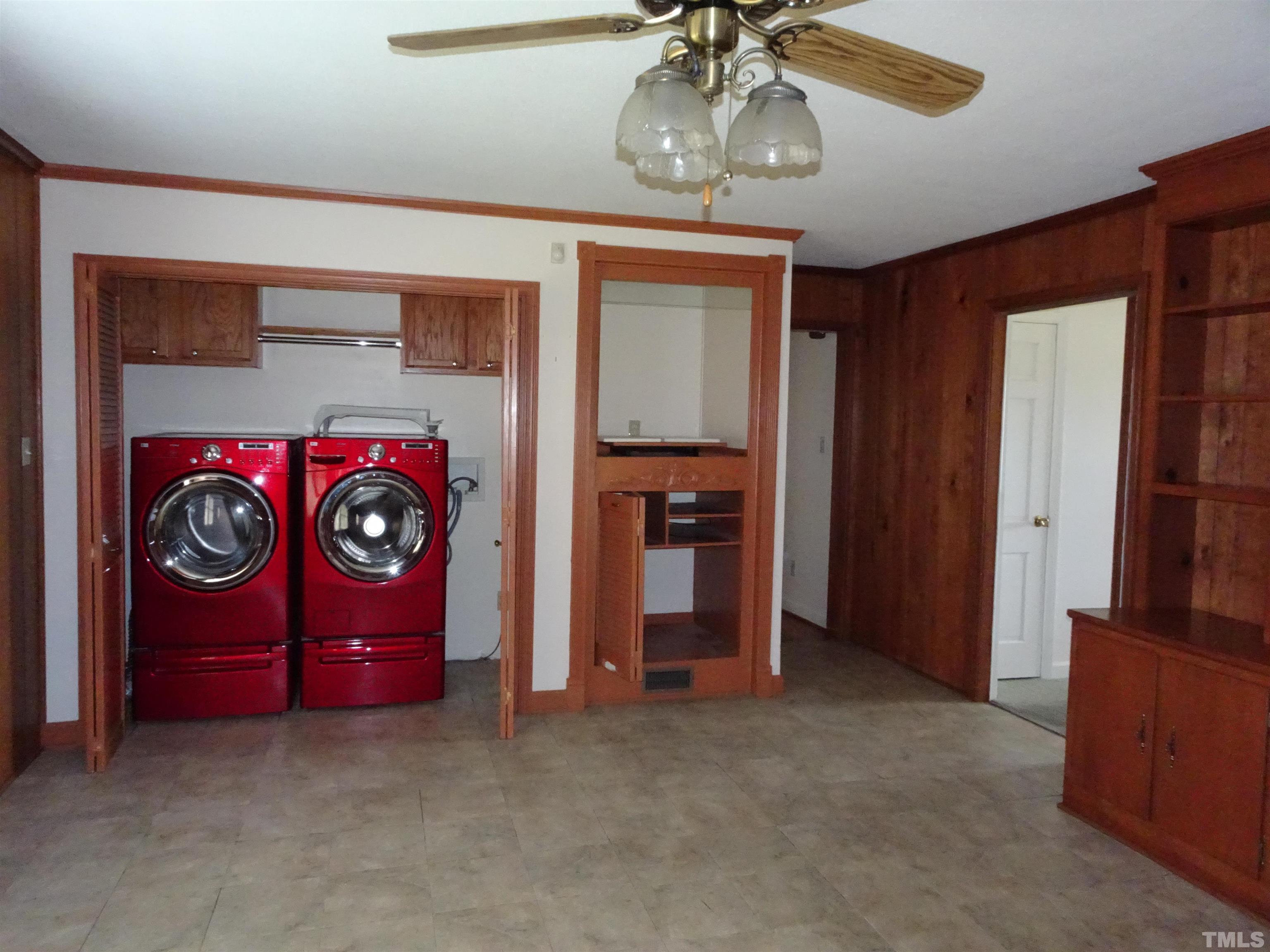 1619 Warrenton Road Henderson, NC 27537 - Photo 13 of 51 In the family room a closet was changed into the washer and dryer area plus another closet.