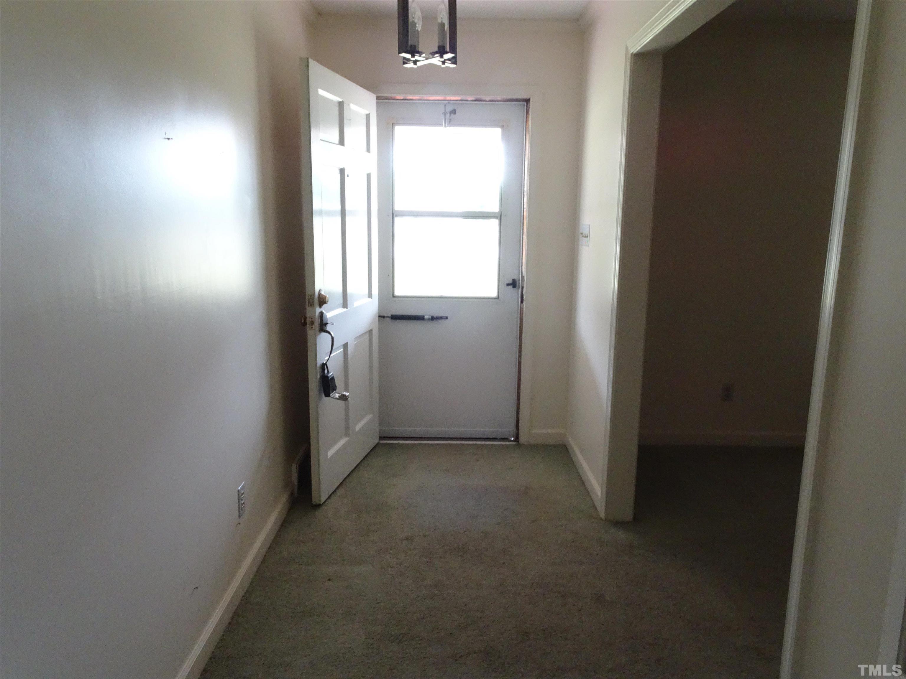 1619 Warrenton Road Henderson, NC 27537 - Photo 2 of 51 Picture to the family room and coat closet