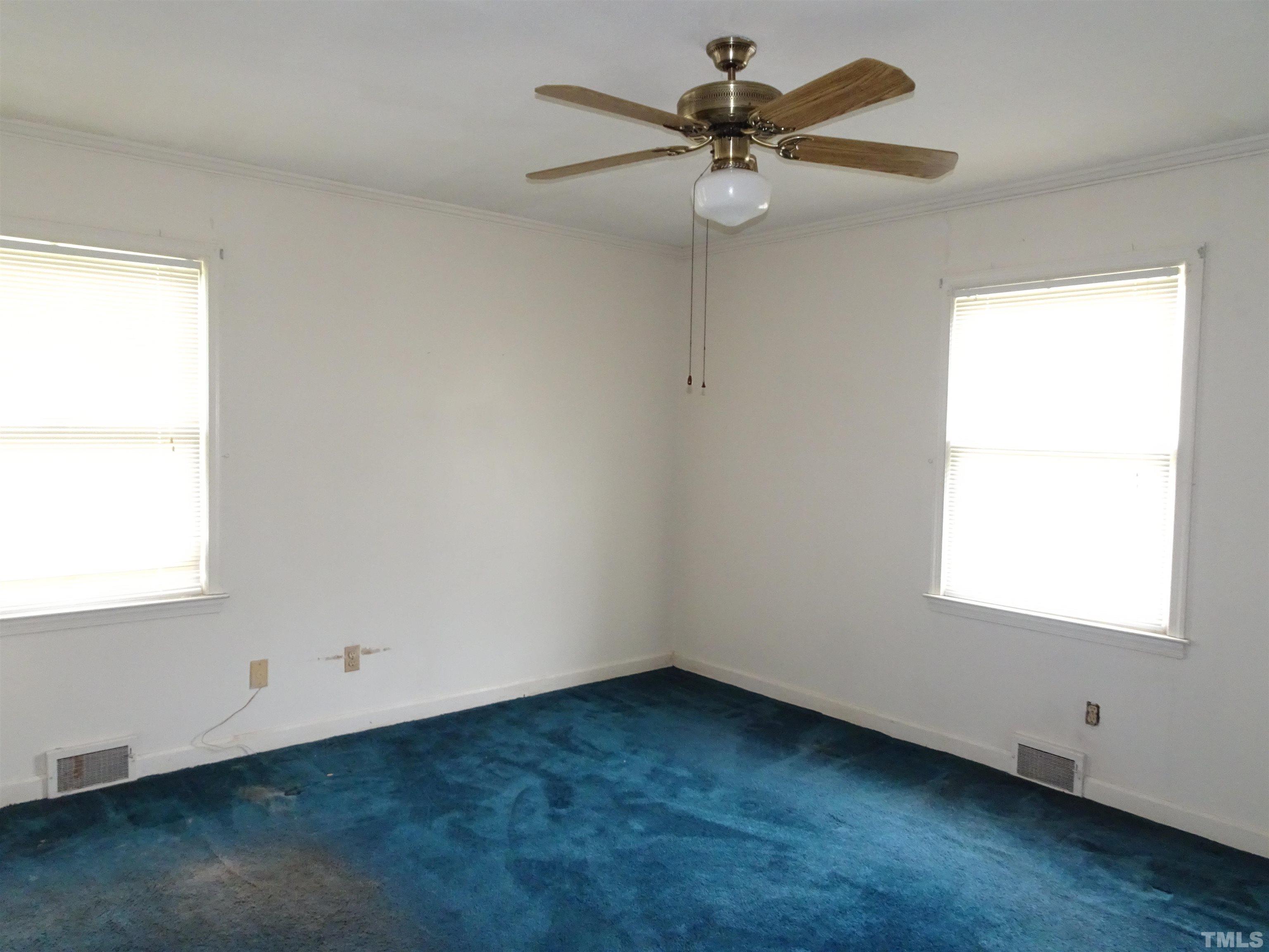 1619 Warrenton Road Henderson, NC 27537 - Photo 24 of 51 The main bedroom with closet and private bath.