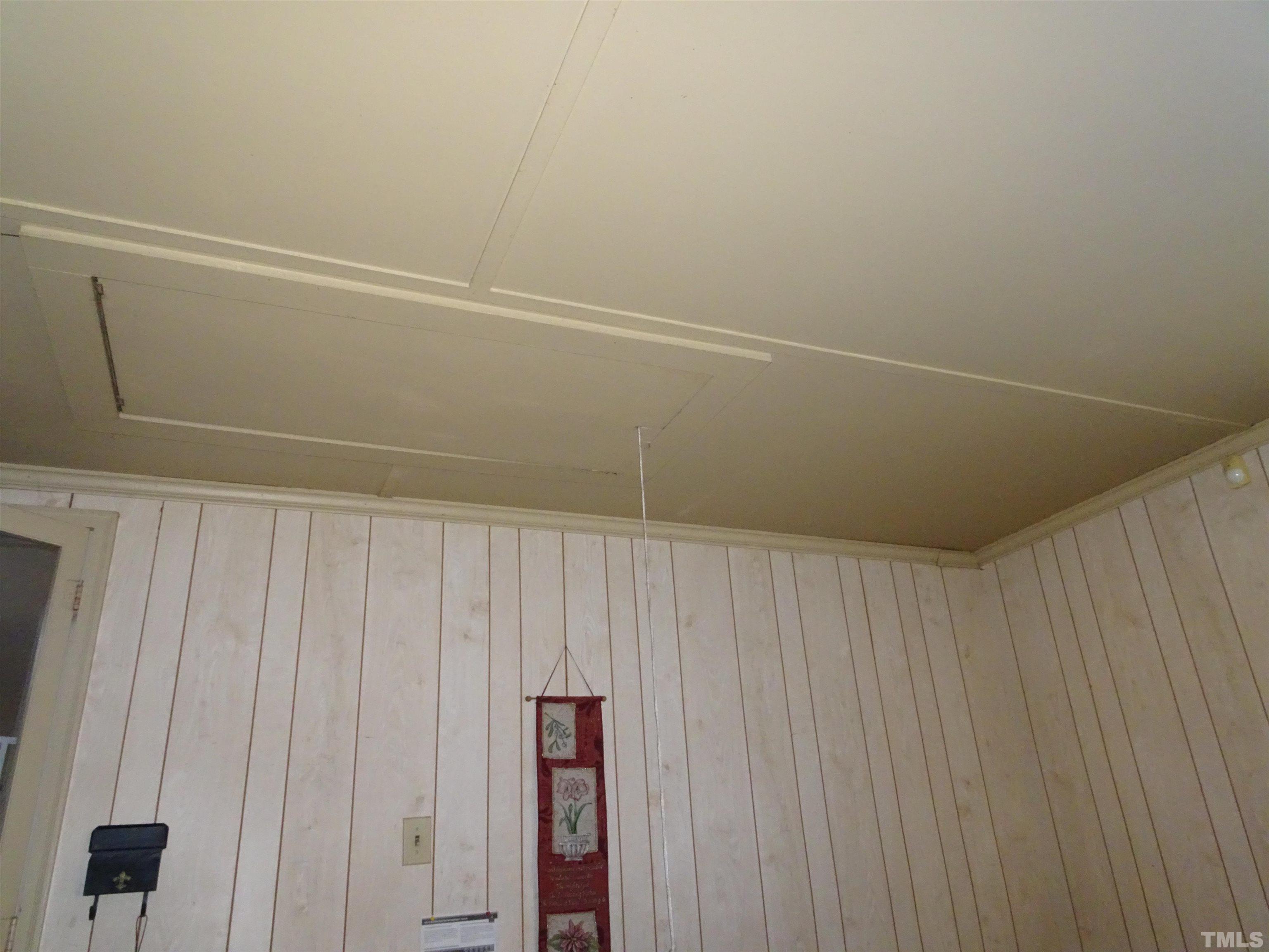 1619 Warrenton Road Henderson, NC 27537 - Photo 27 of 51 The attic is in the garage. The garage also has a sink.