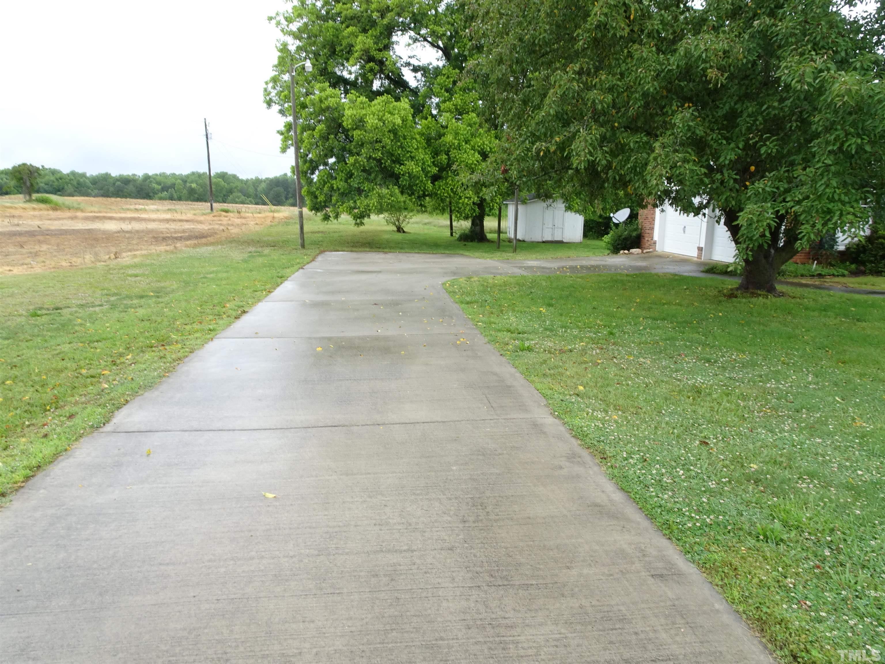 1619 Warrenton Road Henderson, NC 27537 - Photo 44 of 51 You will love the paved driveway from Warrenton Road to the garage
