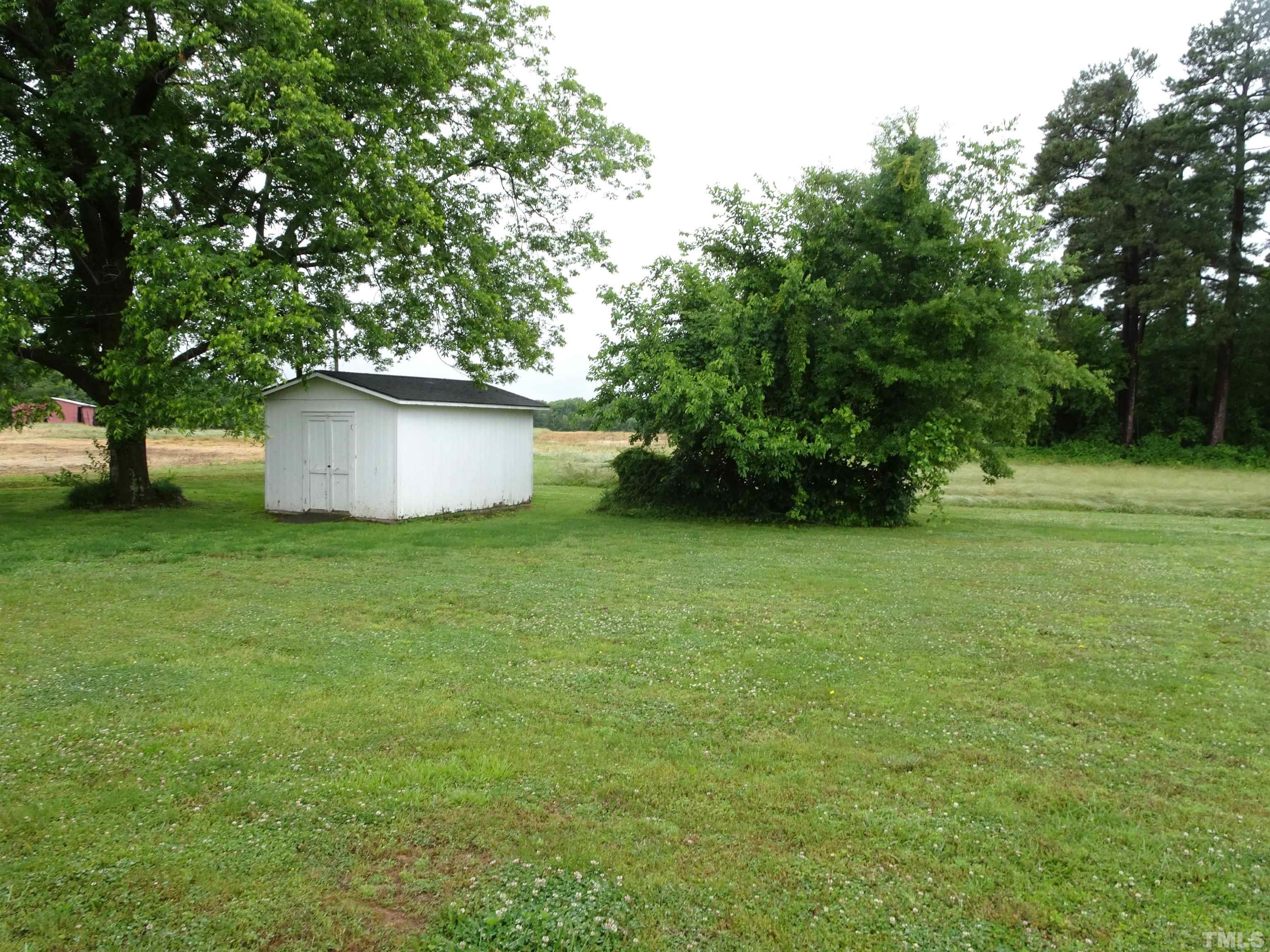 1619 Warrenton Road Henderson, NC 27537 - Photo 48 of 51 Photo showing shed and yard