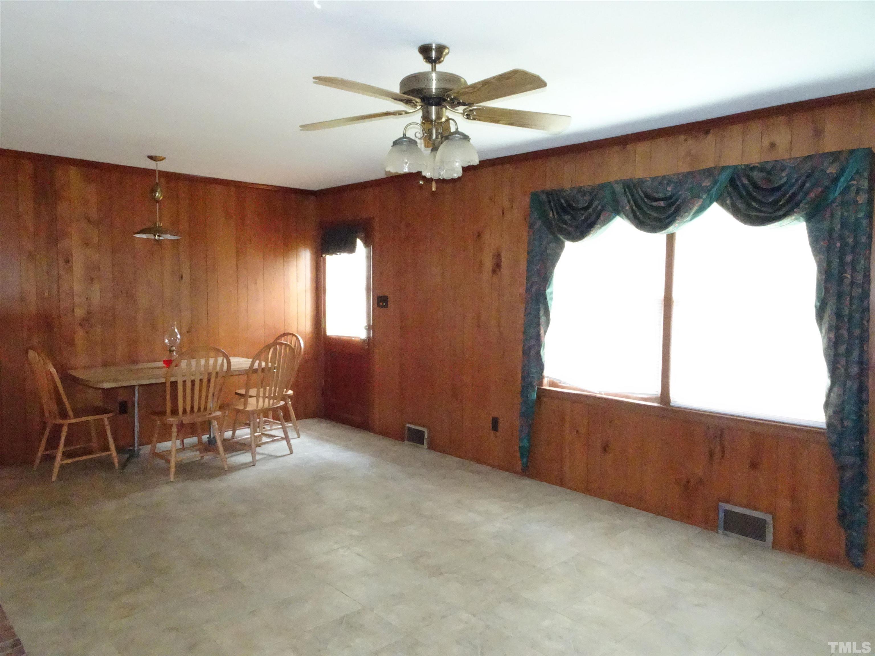1619 Warrenton Road Henderson, NC 27537 - Photo 8 of 51 The family room has a door to the back yard
