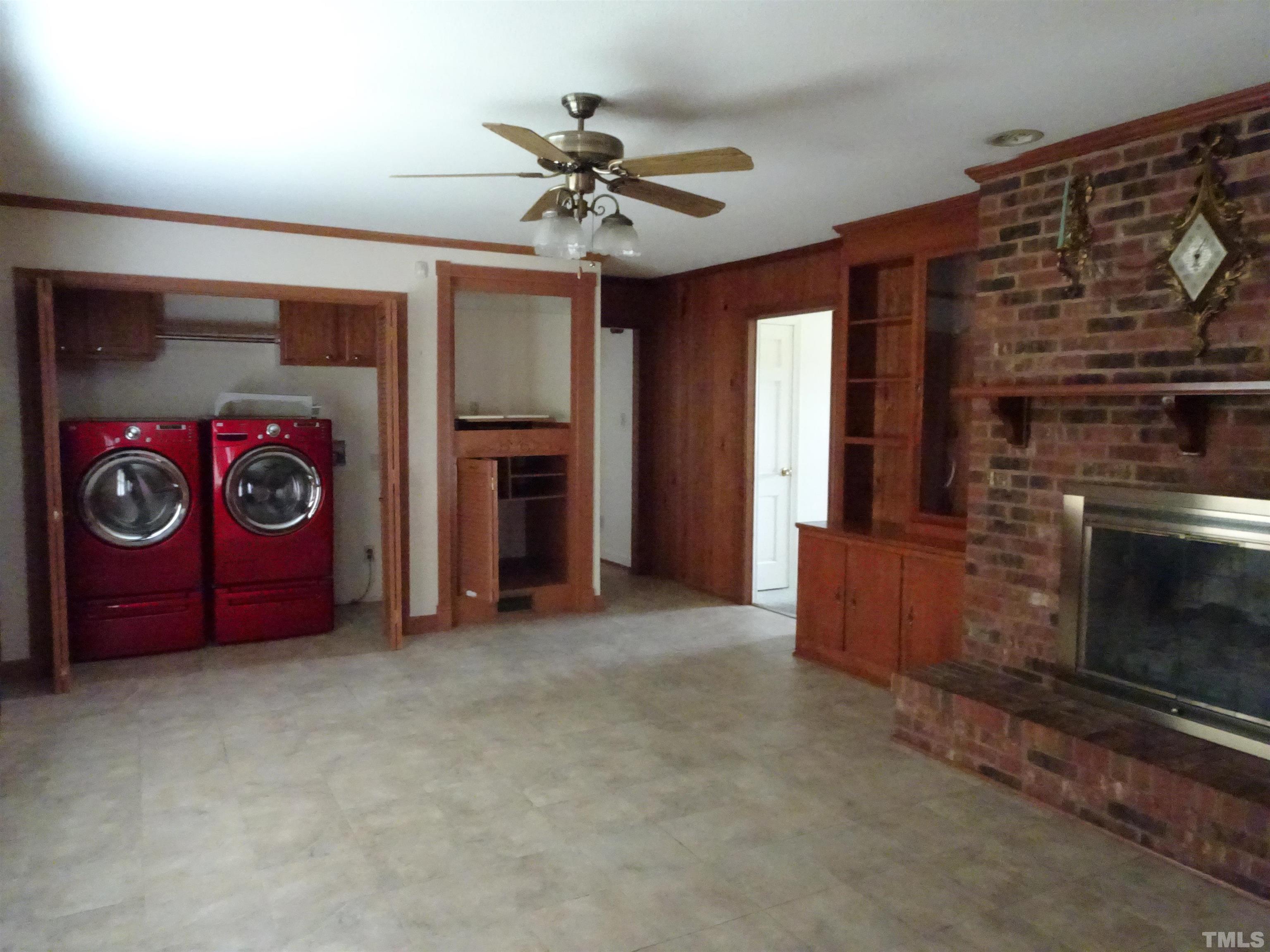 1619 Warrenton Road Henderson, NC 27537 - Photo 9 of 51 The washer and dryer are located in a closet in the family room