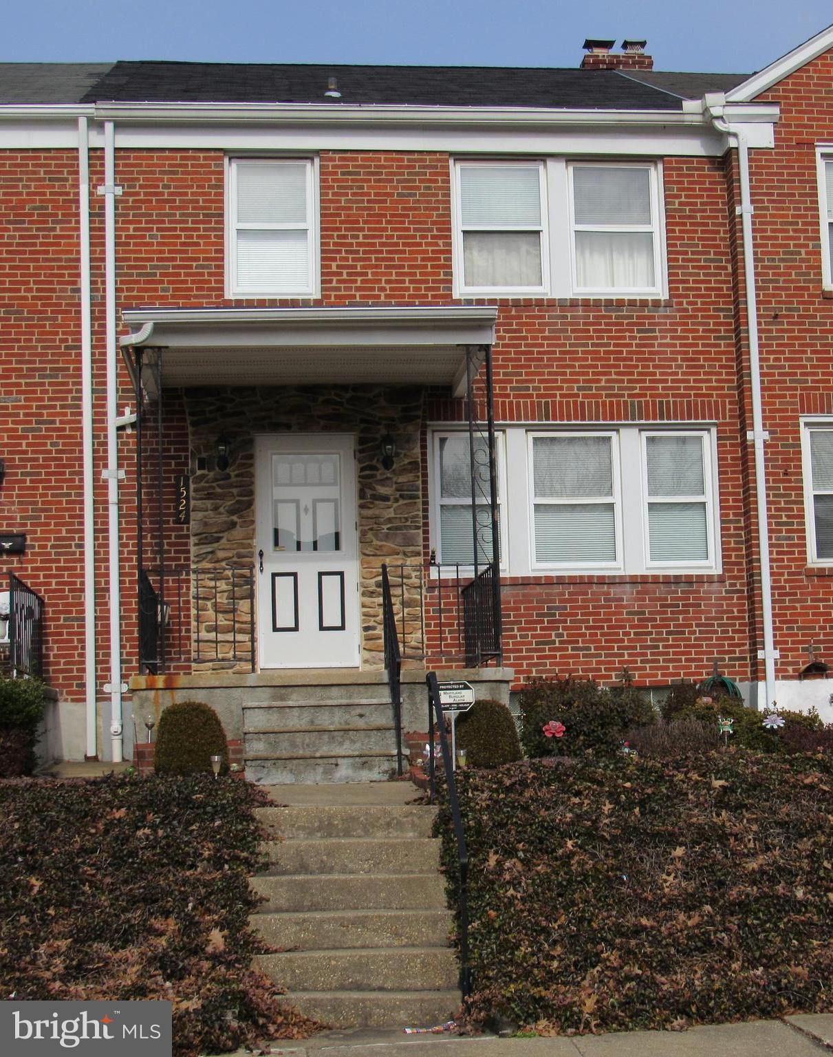 1524 Tunlaw Road Baltimore, MD 21218 - Photo 1 of 34 Brick home with covered front porch