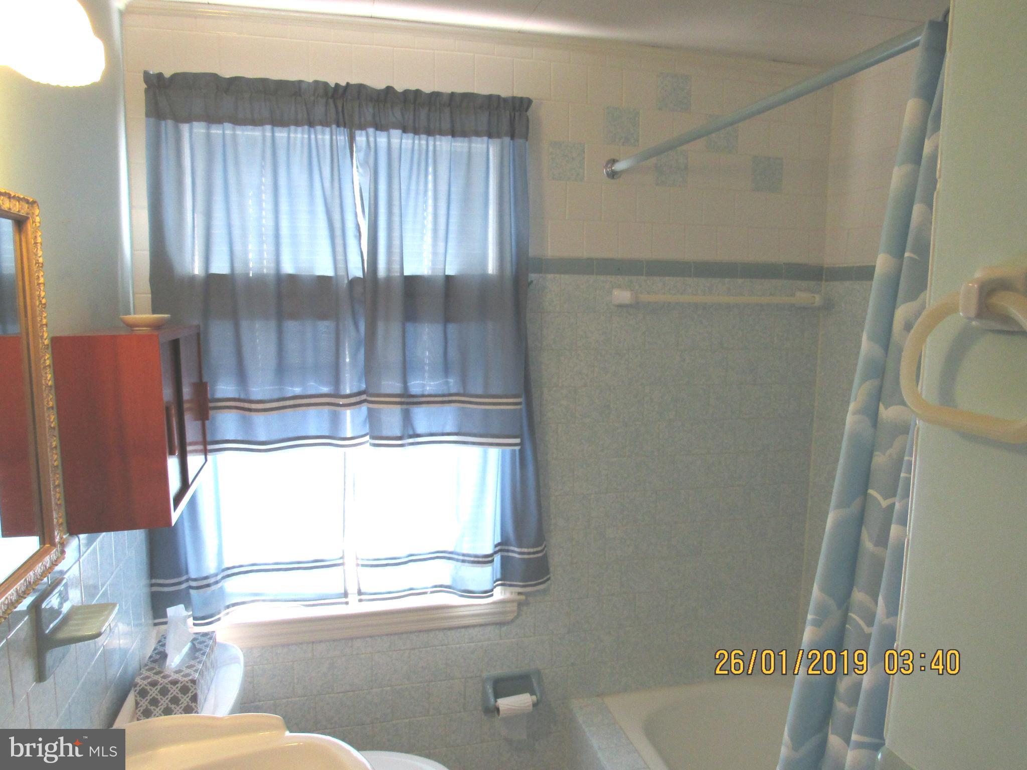 1524 Tunlaw Road Baltimore, MD 21218 - Photo 14 of 34 Full upstairs bathroom