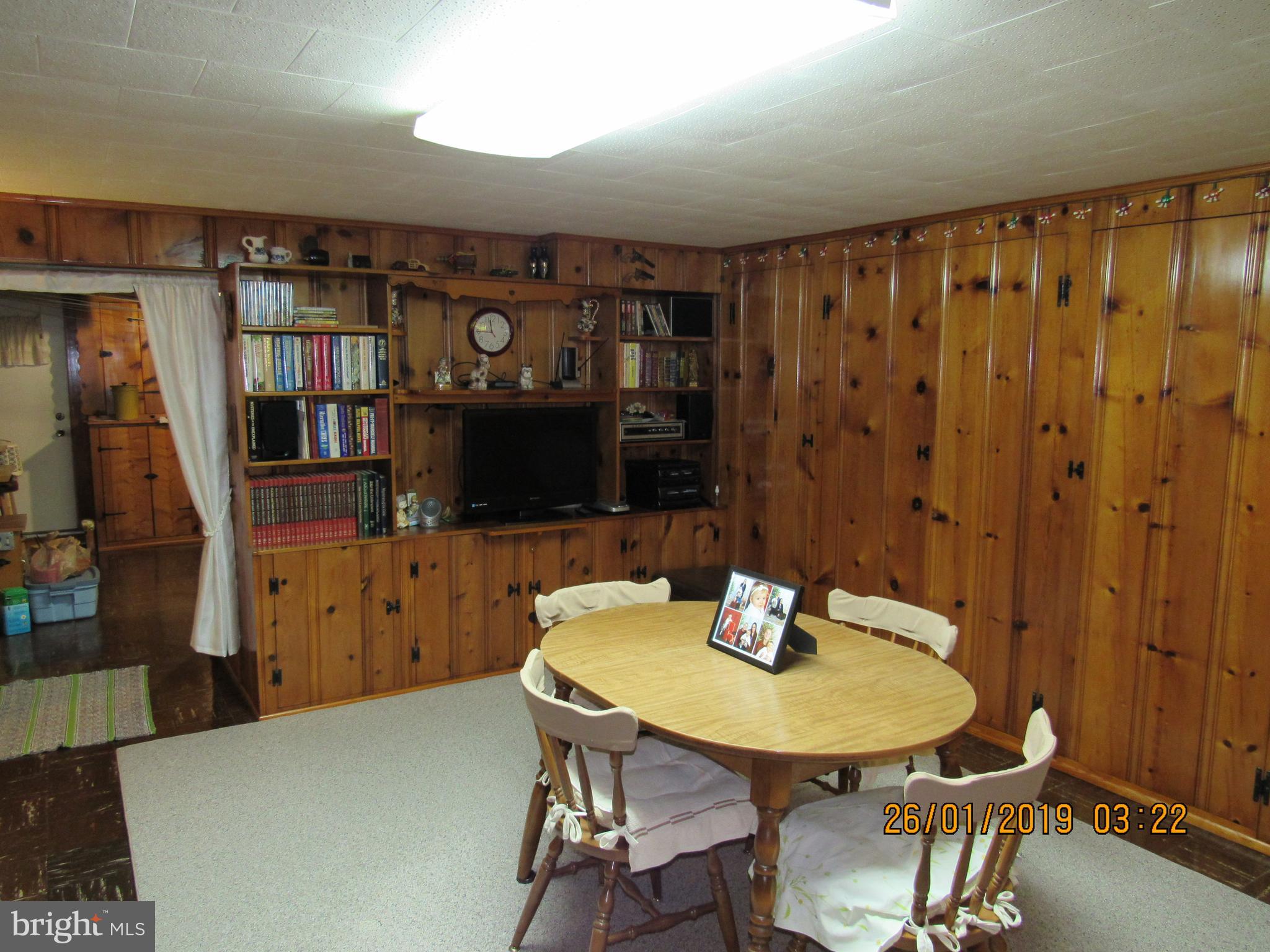 1524 Tunlaw Road Baltimore, MD 21218 - Photo 20 of 34 Knotty pine family room