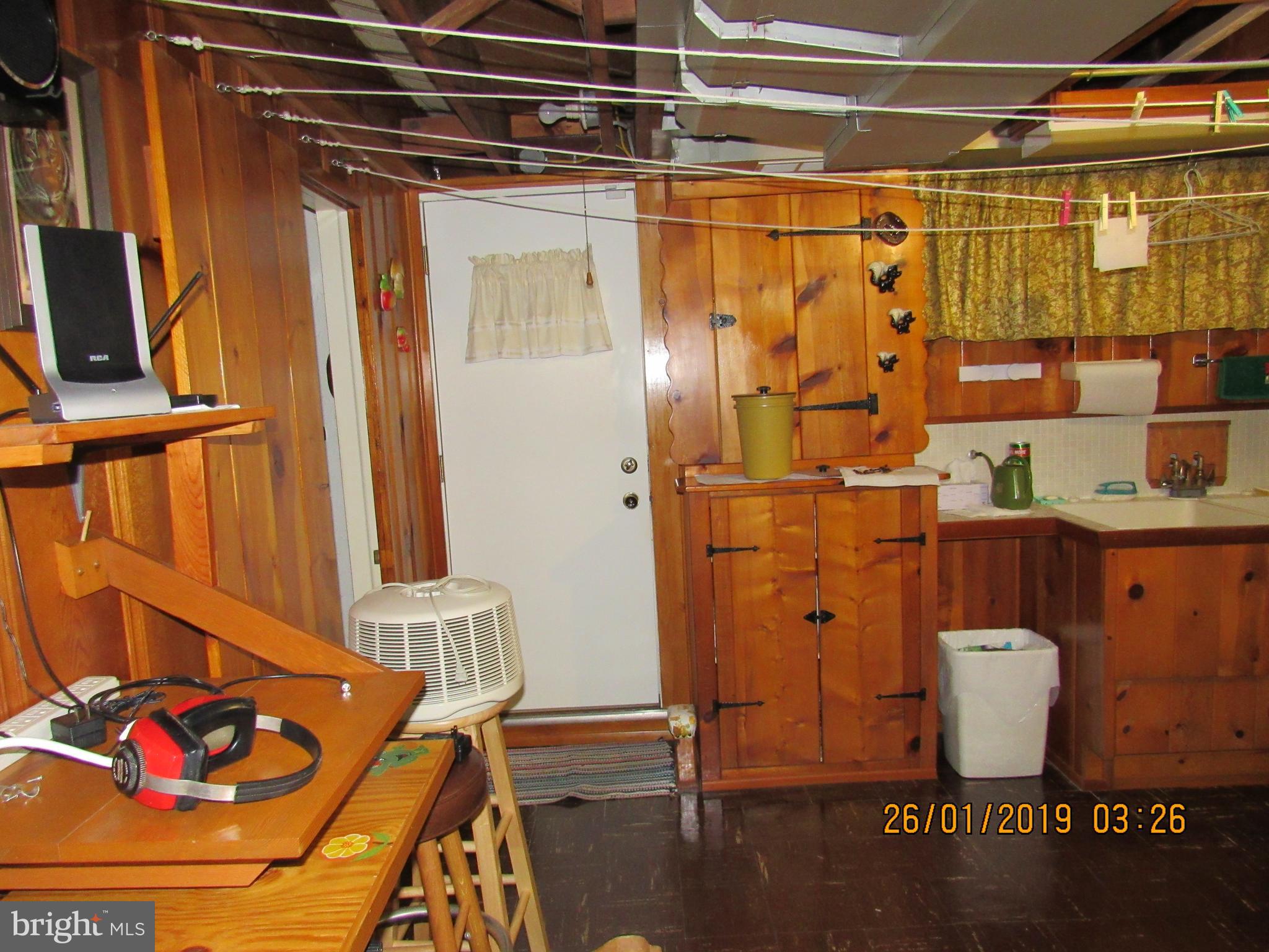 1524 Tunlaw Road Baltimore, MD 21218 - Photo 22 of 34 Workshop and Laundry room