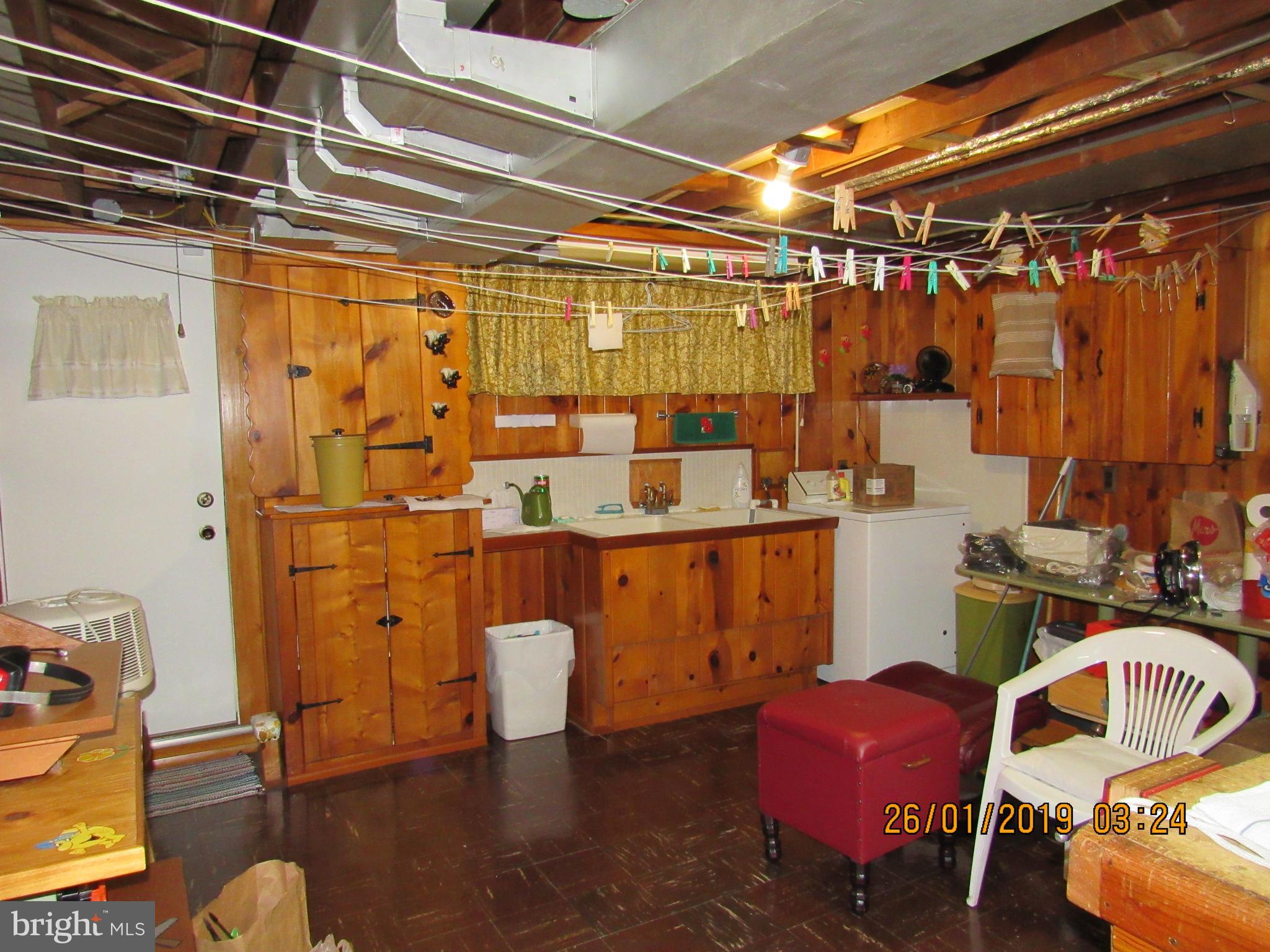 1524 Tunlaw Road Baltimore, MD 21218 - Photo 27 of 34 Laundry room and workshop