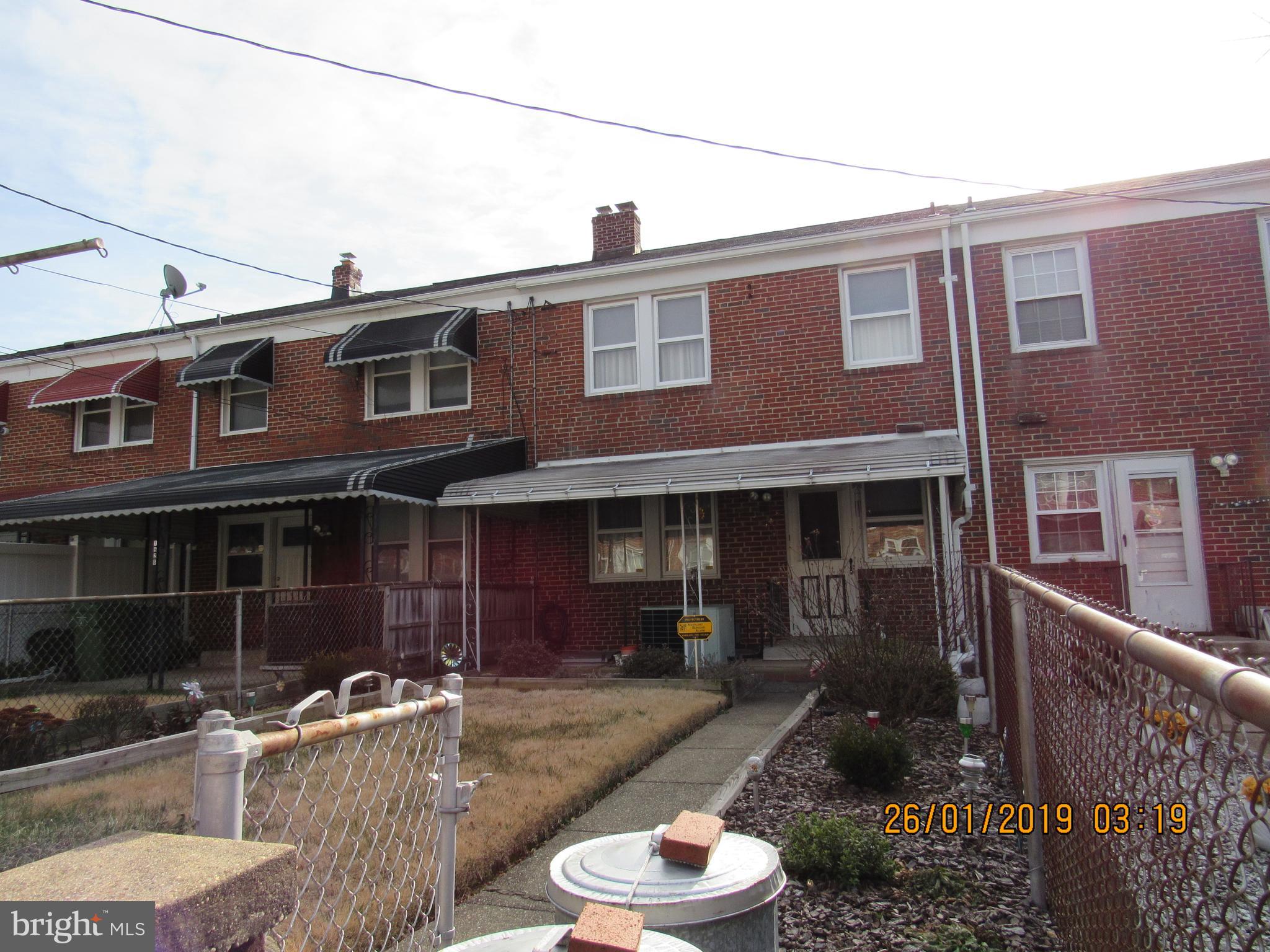 1524 Tunlaw Road Baltimore, MD 21218 - Photo 30 of 34 Deep completely fenced yard