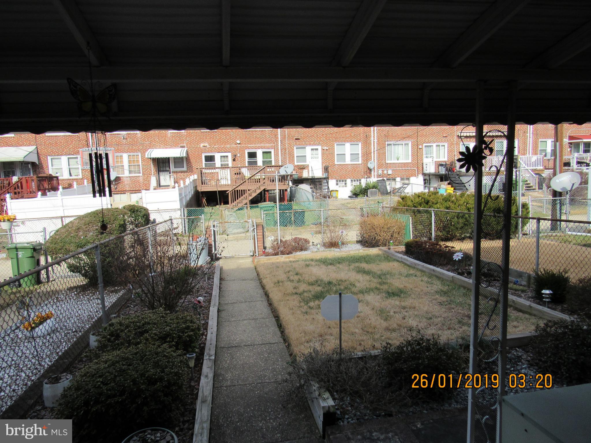 1524 Tunlaw Road Baltimore, MD 21218 - Photo 33 of 34 Covered back patio