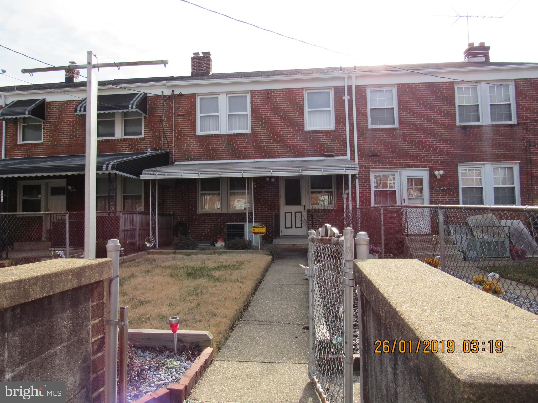 1524 Tunlaw Road Baltimore, MD 21218 - Photo 34 of 34 Fenced back yard