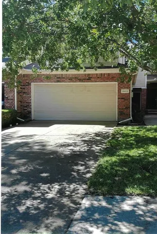 a view of yard with large tree