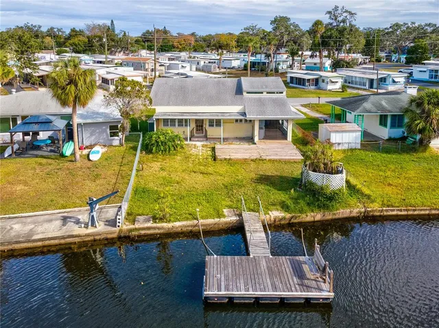 a view of a swimming pool with lounge chair