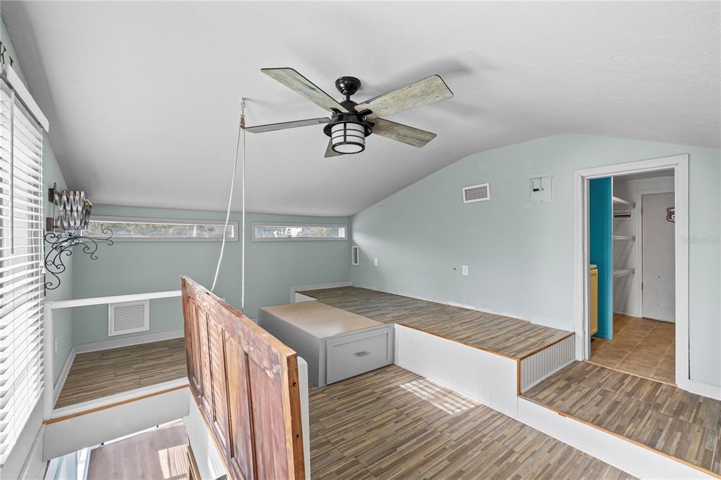 5642 Riverview Drive New Port Richey, FL 34652 - Photo 22 of 41 a view of a hallway view with staircase