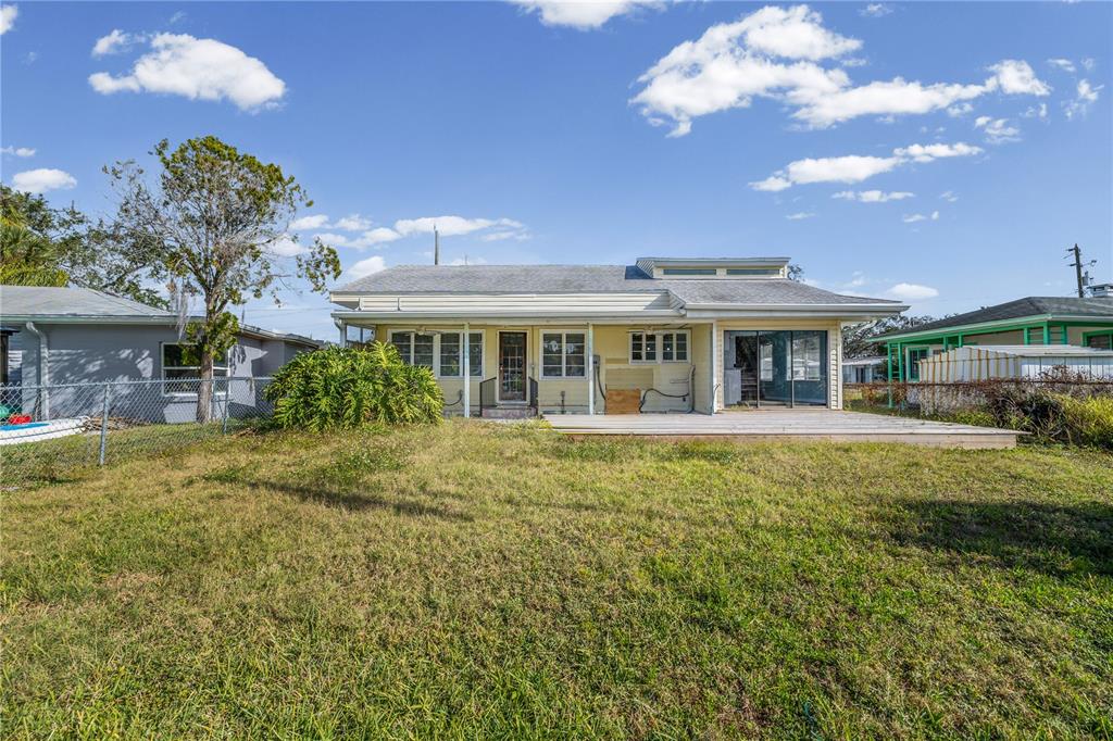 5642 Riverview Drive New Port Richey, FL 34652 - Photo 26 of 41 a view of a house with a swimming pool