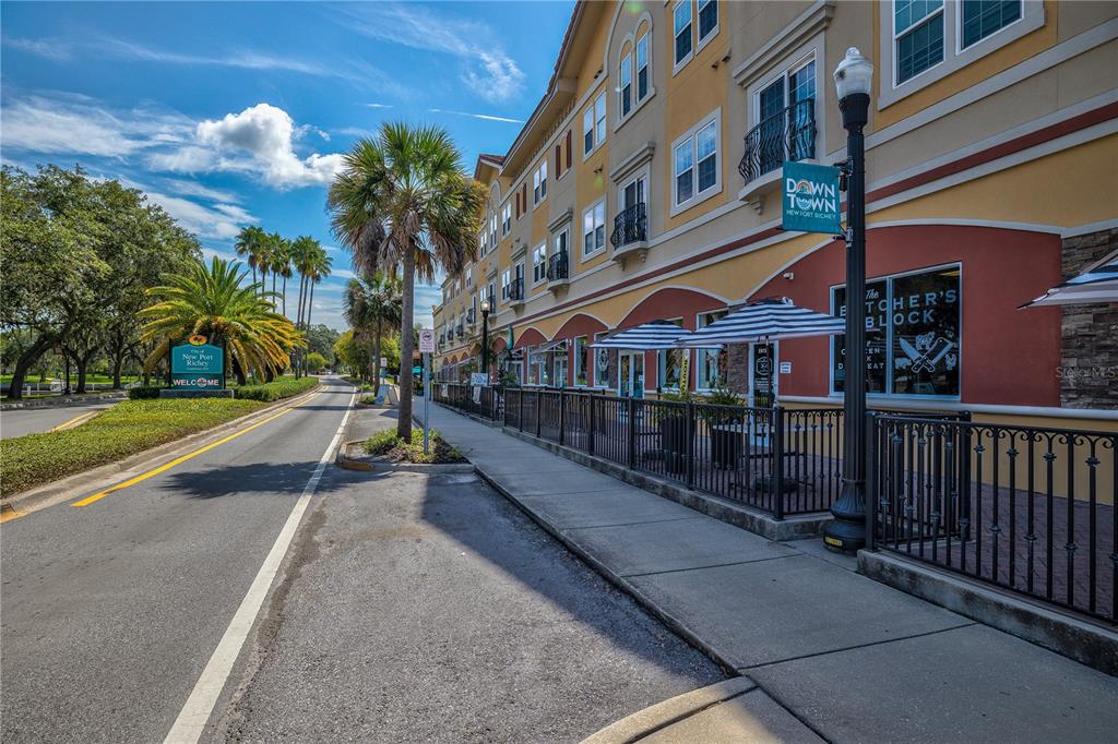 5642 Riverview Drive New Port Richey, FL 34652 - Photo 33 of 41 a view of a building with a swimming pool