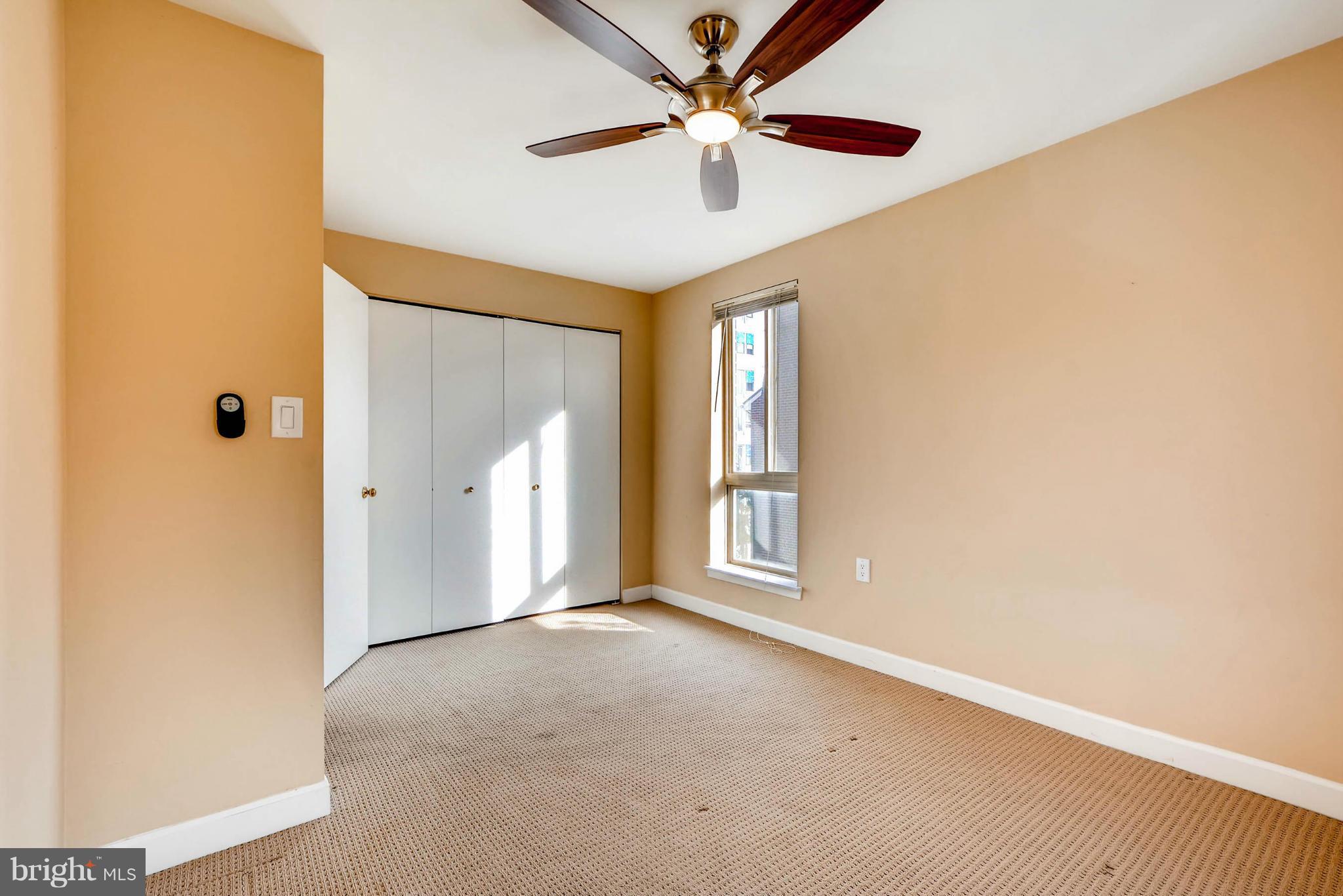 620 Charles Street, Unit R33 Baltimore, MD 21230 - Photo 15 of 27 a view of an empty room with a window