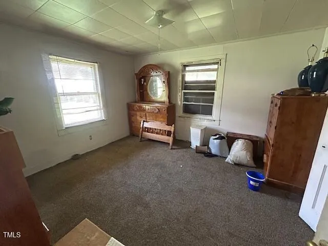 a room with furniture and windows