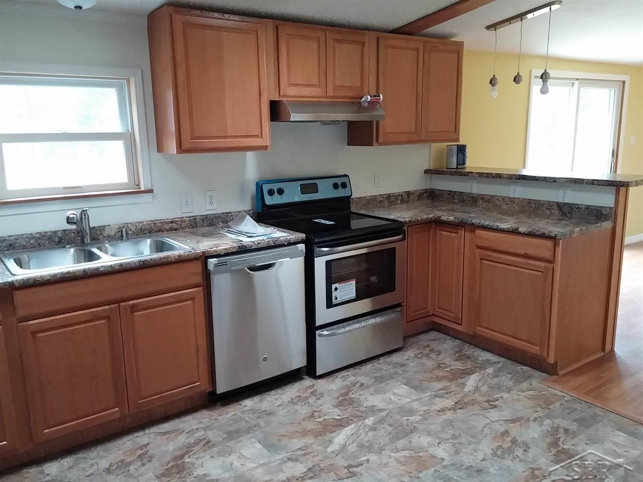 All newly installed cabinets, countertops, and appliances