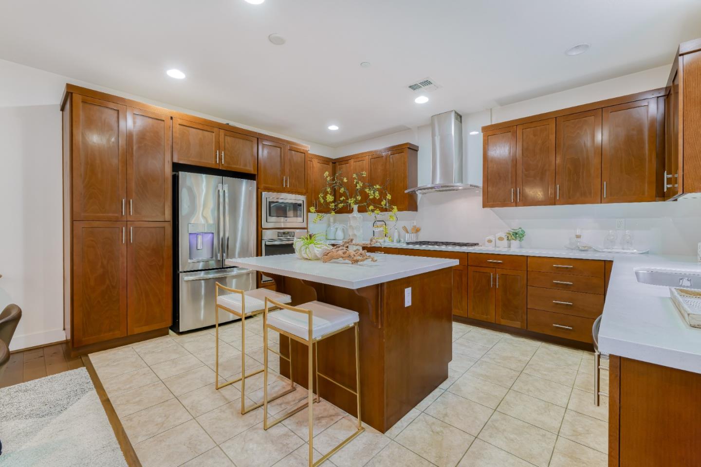 37431 Talamore Common Fremont, CA 94536 - Photo 13 of 41 a kitchen with stainless steel appliances granite countertop a sink counter space and cabinets