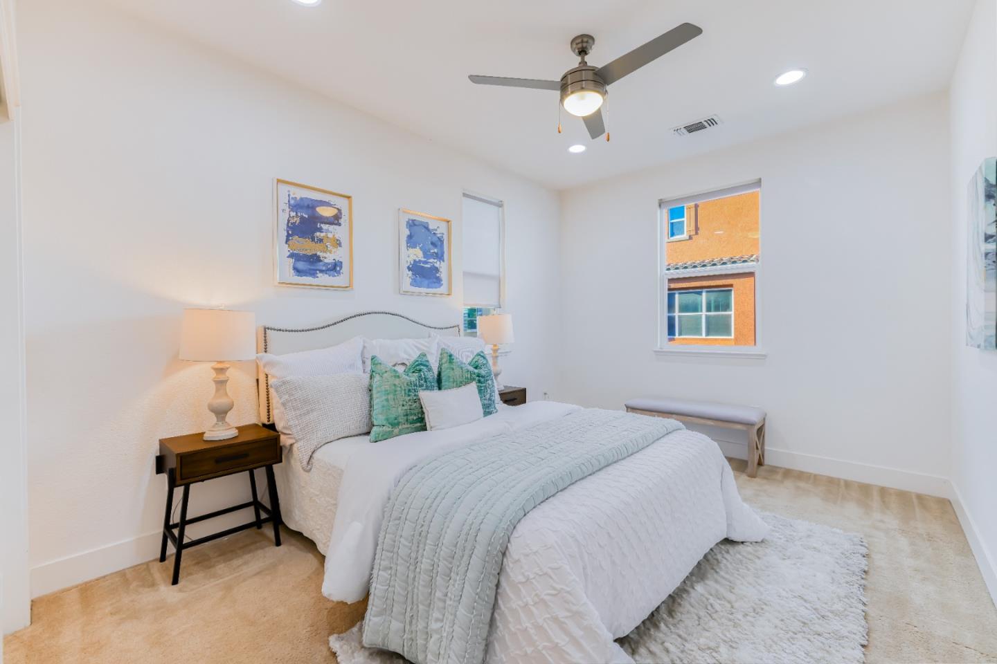 37431 Talamore Common Fremont, CA 94536 - Photo 20 of 41 a bedroom with a bed and a desk