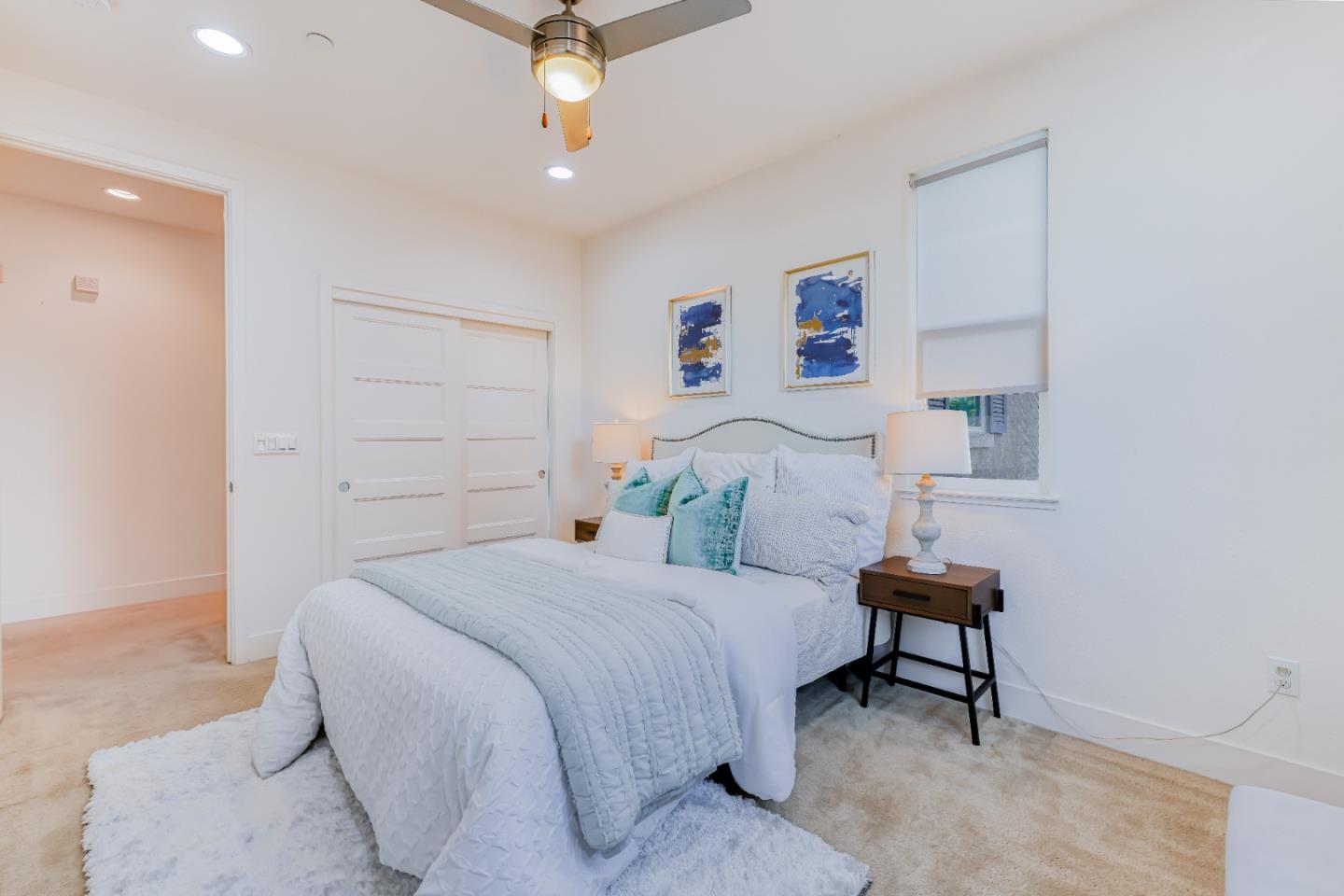 37431 Talamore Common Fremont, CA 94536 - Photo 21 of 41 a bedroom with a bed and a table