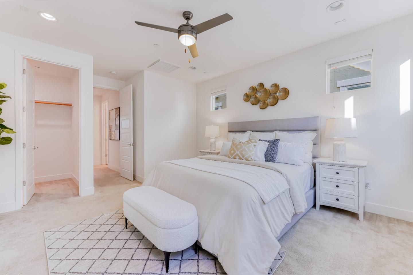 37431 Talamore Common Fremont, CA 94536 - Photo 27 of 41 a bedroom with a bed and a chandelier