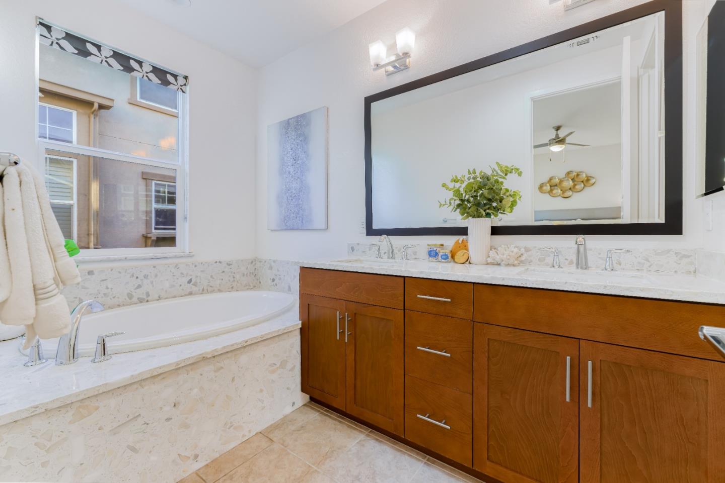 37431 Talamore Common Fremont, CA 94536 - Photo 29 of 41 a bathroom with a sink and a bathtub