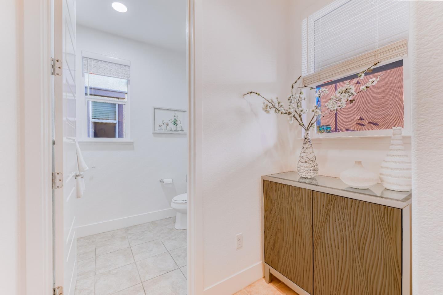 37431 Talamore Common Fremont, CA 94536 - Photo 6 of 41 a view of bathroom with a sink and a mirror
