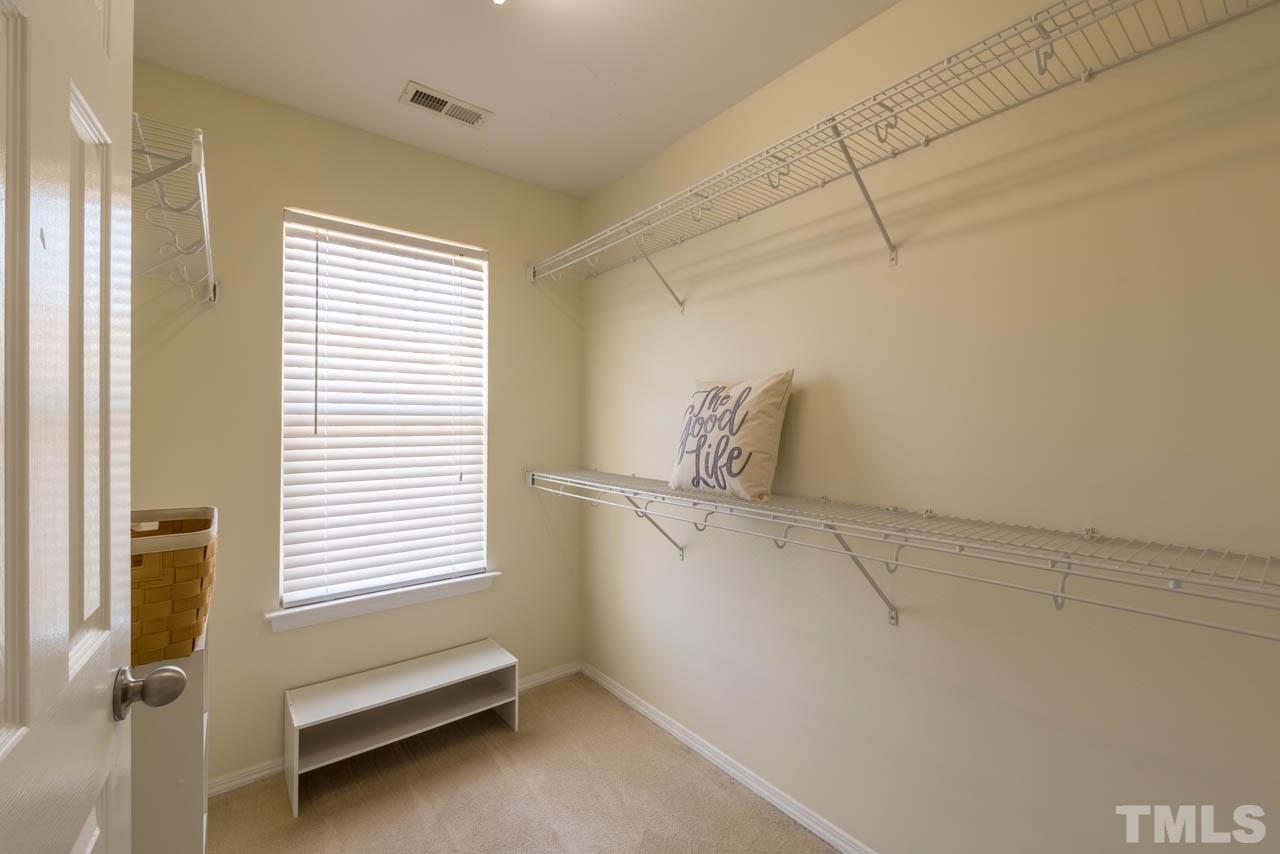 8214 Beaded Stone Street Raleigh, NC 27613 - Photo 14 of 25 a view of room and window