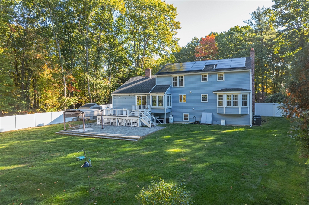 1 Ellsworth Road Andover, MA 01810 - Photo 3 of 6 a view of a house with a yard balcony and sitting area