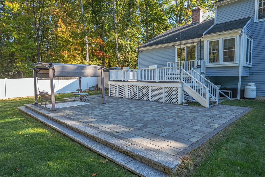 1 Ellsworth Road Andover, MA 01810 - Photo 5 of 6 a front view of a house with garden