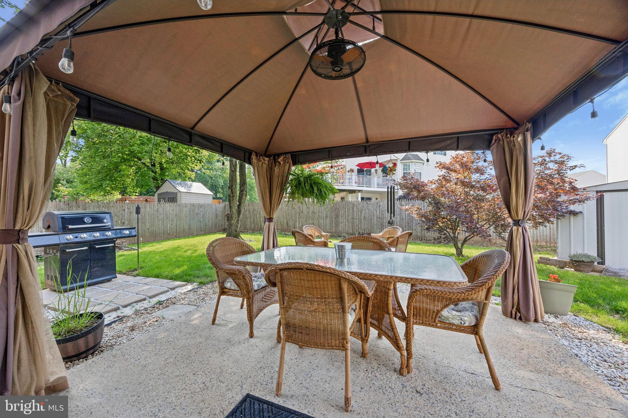 984 Rill Road Reading, PA 19606 - Photo 17 of 26 a table and chairs in the patio