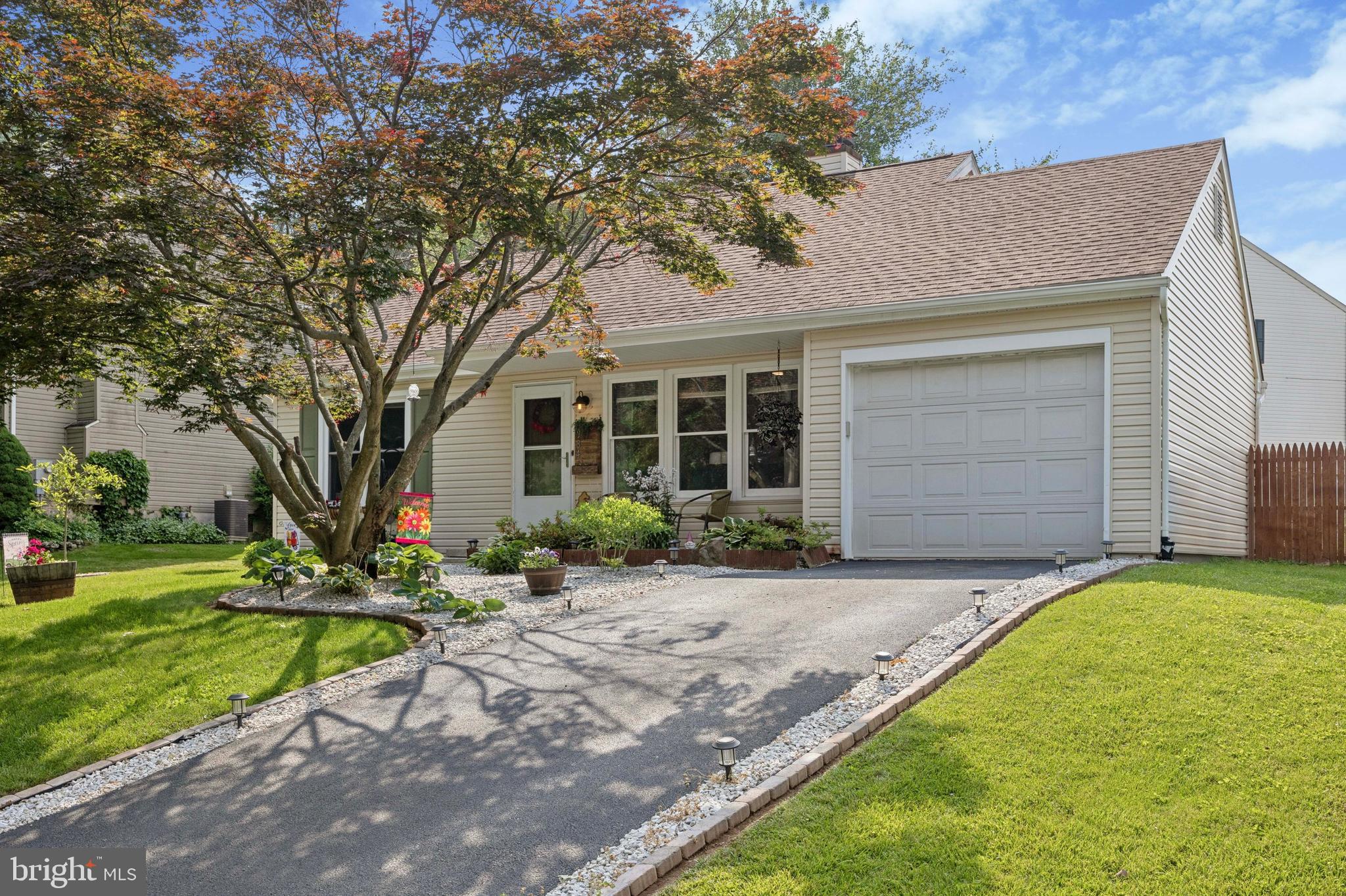 984 Rill Road Reading, PA 19606 - Photo 2 of 26 a front view of a house with a yard and garage