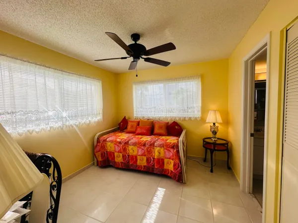 $239,900 | 19 Colonial Club Drive, Unit 105, Boynton Beach, FL 33435
