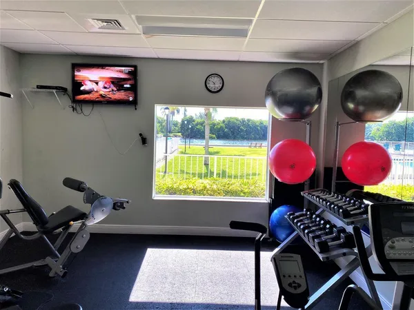 $239,900 | 19 Colonial Club Drive, Unit 105, Boynton Beach, FL 33435