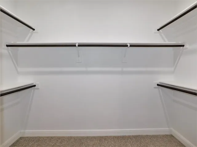 a view of a refrigerator in kitchen