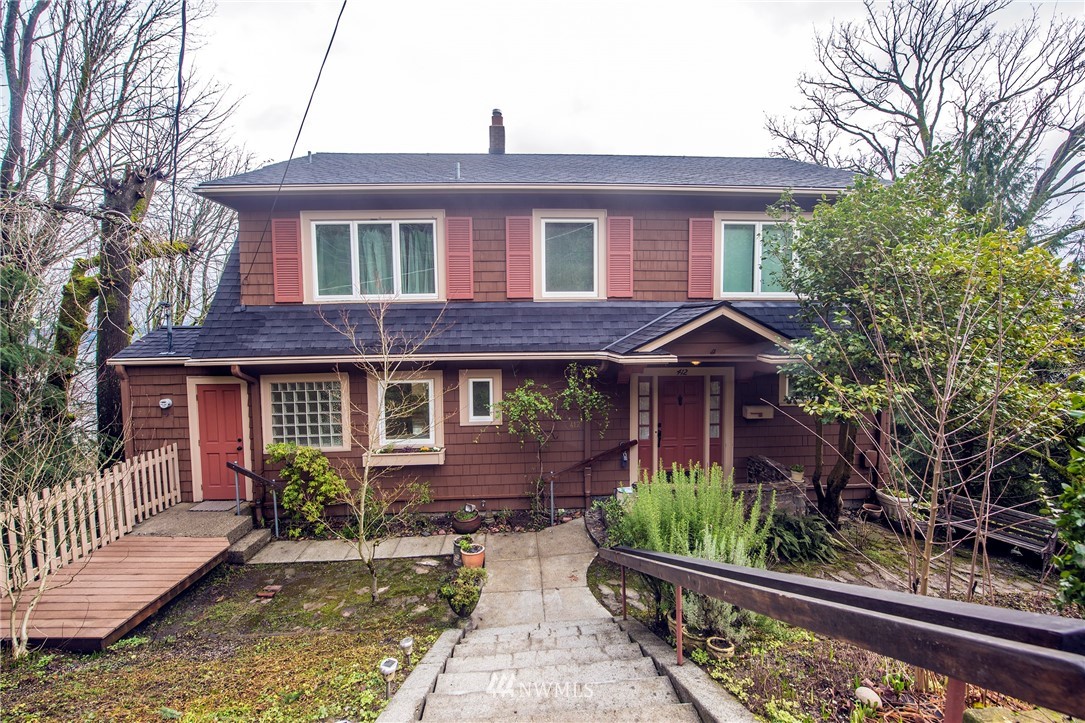 412 36th Avenue Seattle, WA 98122 - Photo 1 of 25 a house view with a garden space