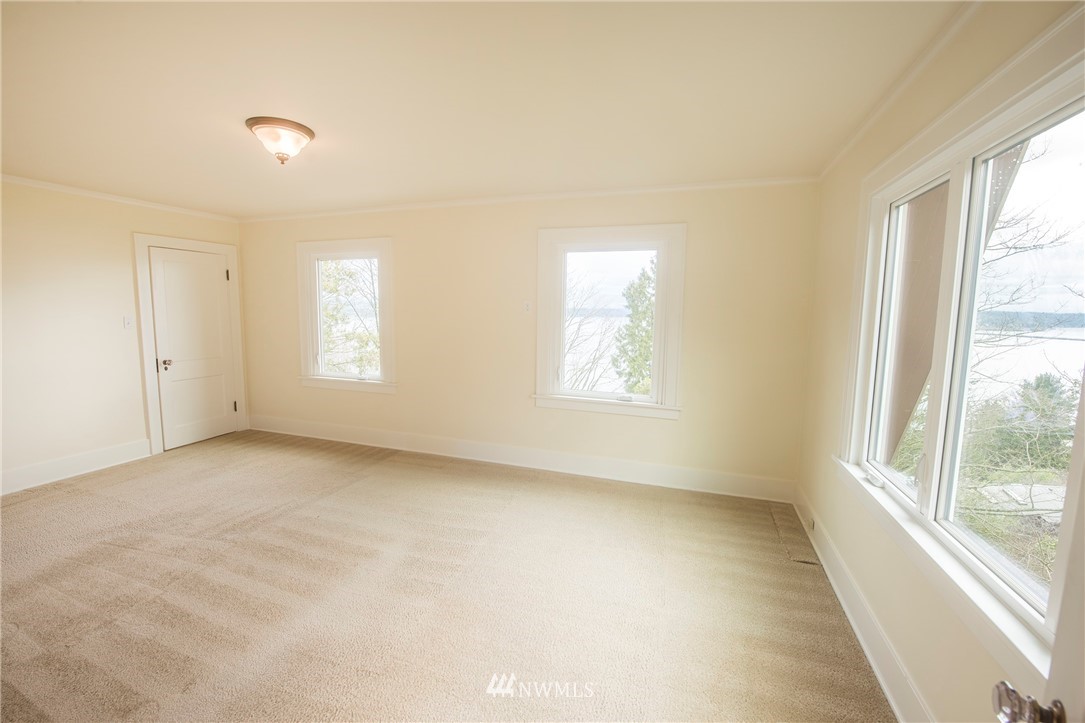 412 36th Avenue Seattle, WA 98122 - Photo 17 of 25 a view of an empty room with a window