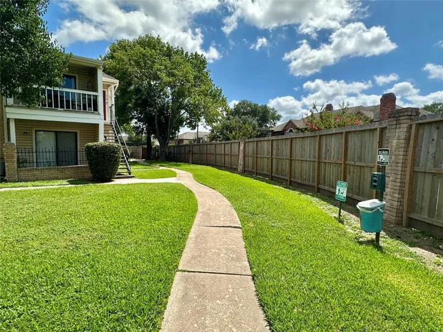 a view of a backyard with a garden