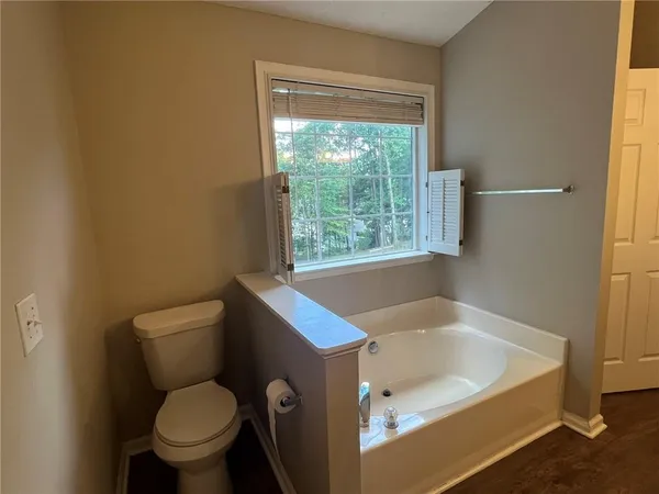 a bathroom with a sink and a washer dryer