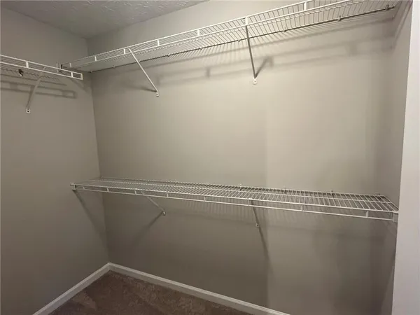a view of small space with racks on the wall